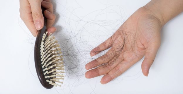 hair loss shedding hand brush strands normal hair loss viviscal blog
